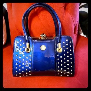 Blue patent leather handbag with rhinestones